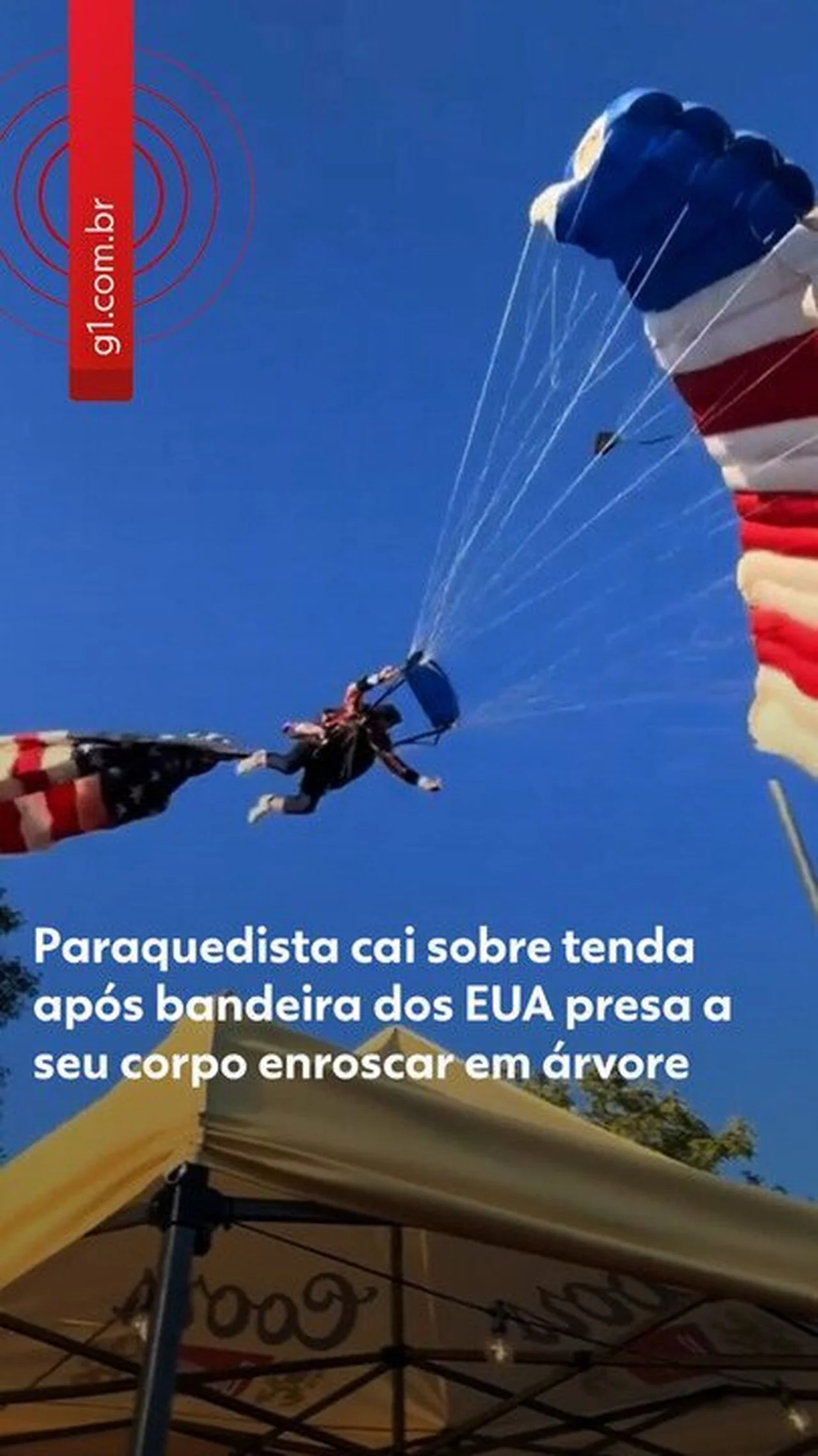 Paraquedista cai sobre tenda após bandeira dos EUA enroscar em árvore